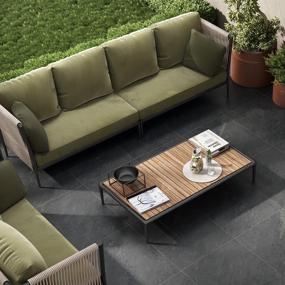 Green drenching gardening trend with green furniture and porcelain patio